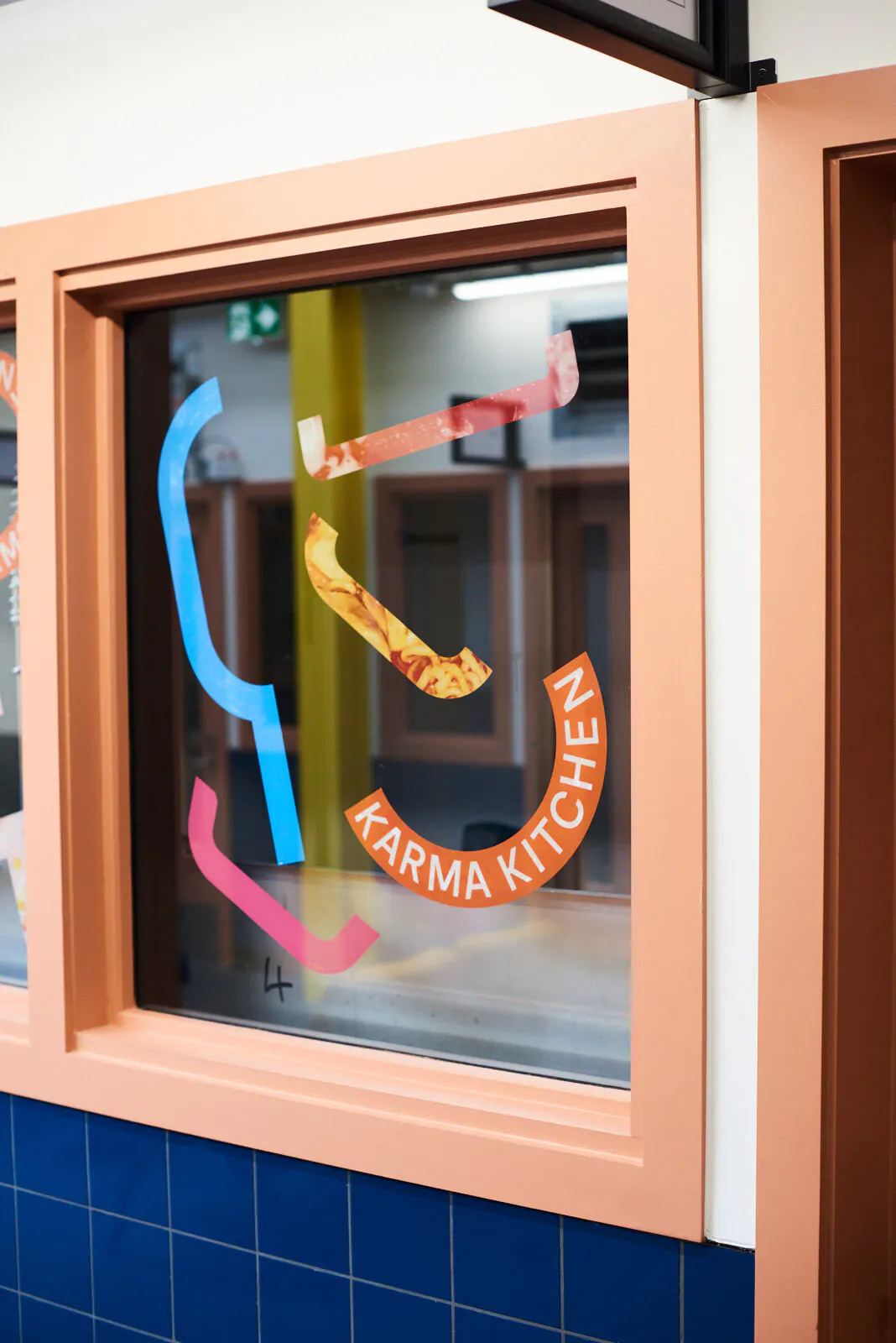 Bermondsey window Karma Kitchen logo2