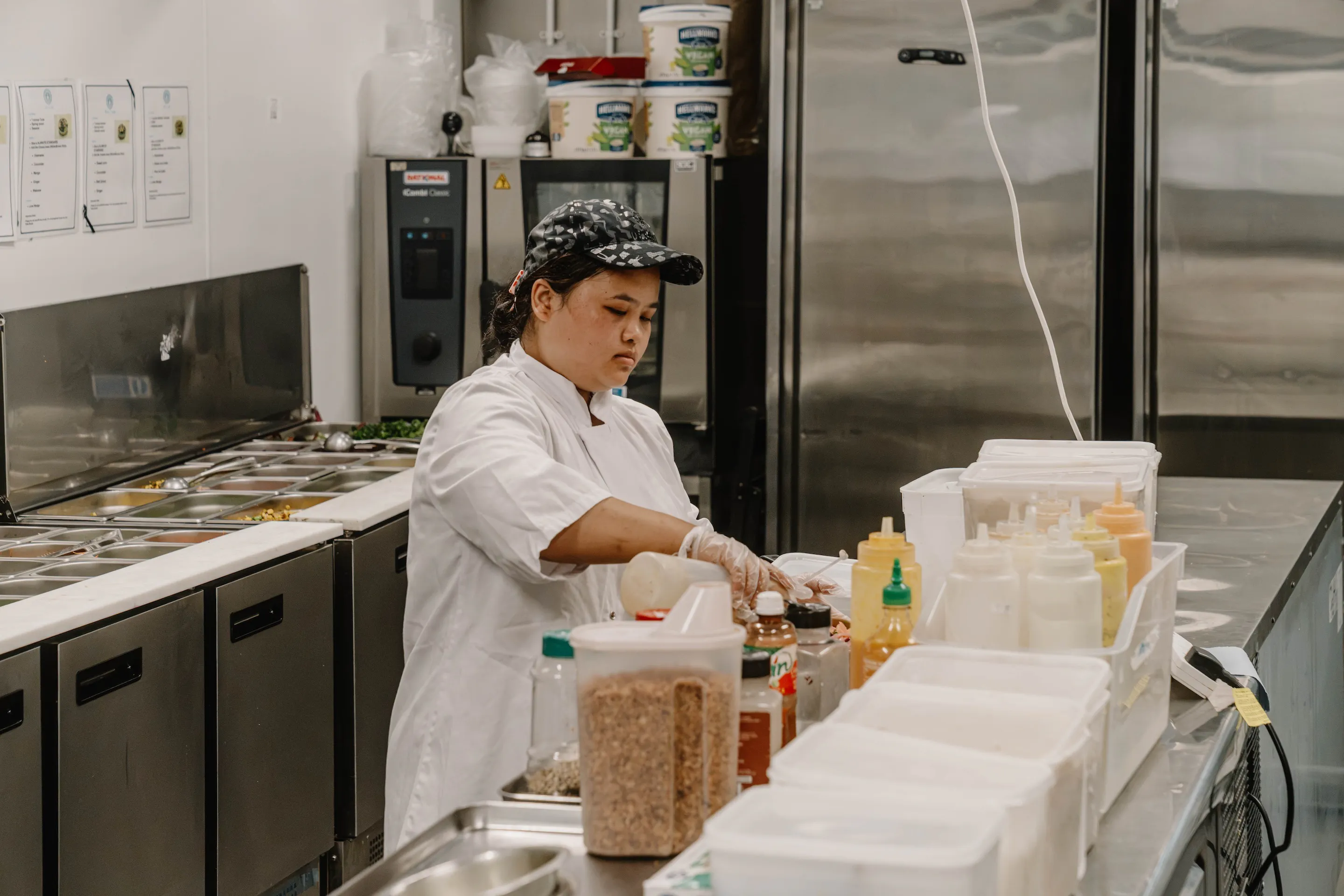 Chef packing orders into containers