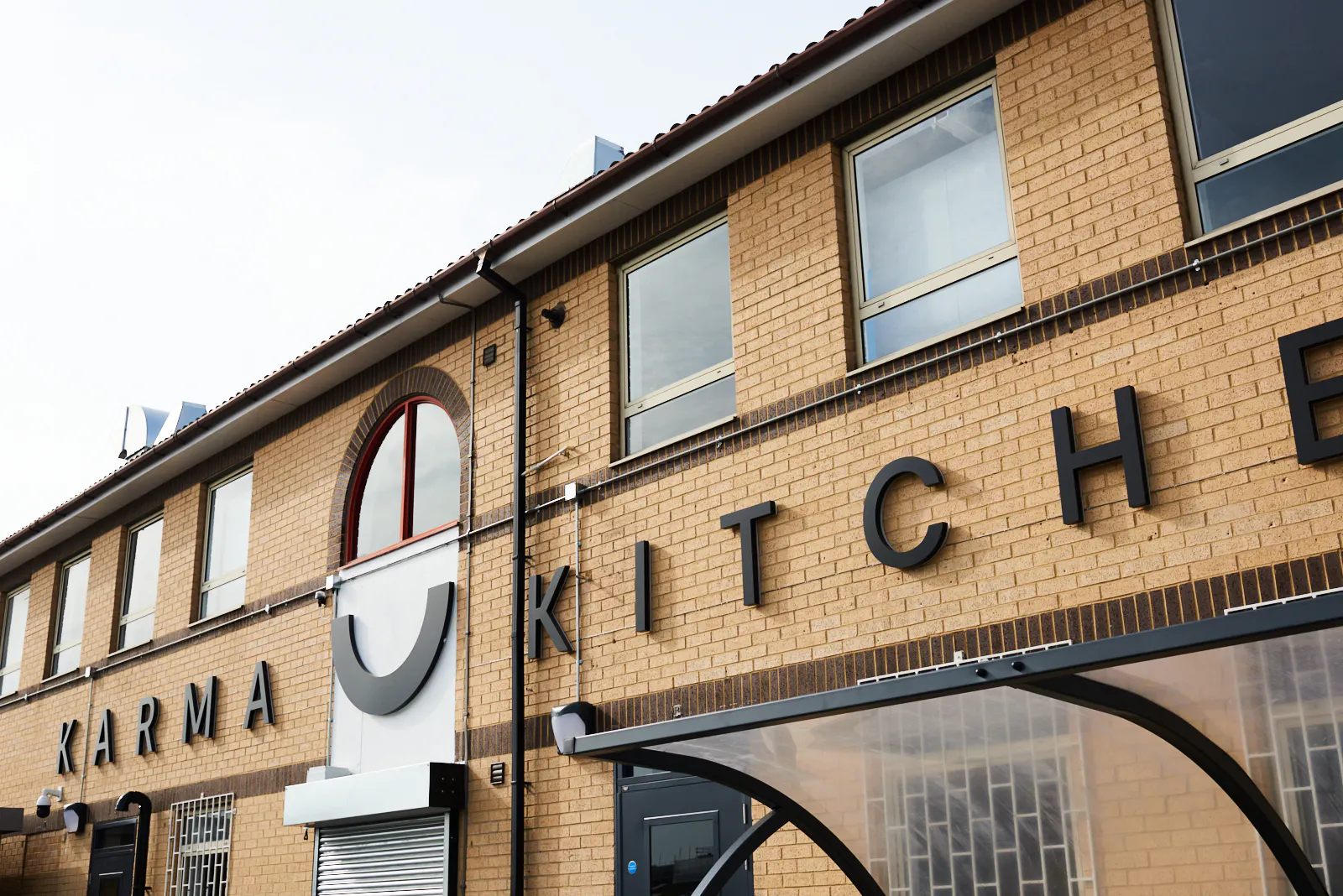 Crystal Palace site entrance Karma Kitchen